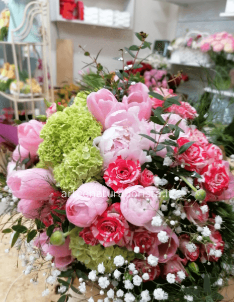 Bouquet con i toni del rosa e verde